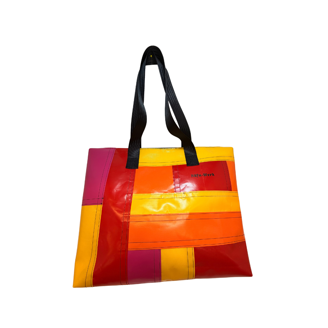 Kühltasche in Rot-Orange-Gelb mit Aufdruck "Häfn Werk"